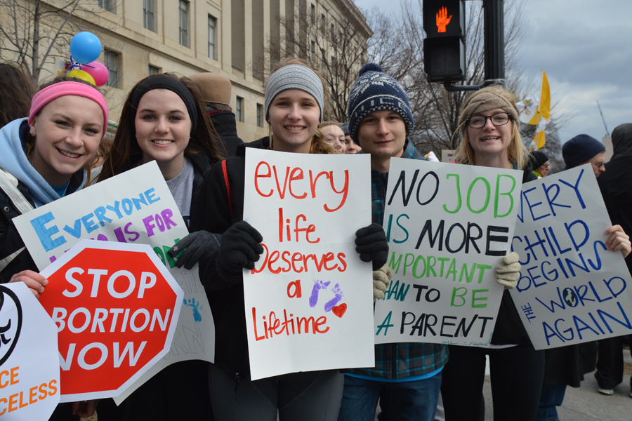 Young_people_hold_prolife_signs_during_the_2015_March_for_Life_in_Washington_DC_on_Jan_22_2015_Credit_Addie_Mena_CNA_CNA_1_22_15